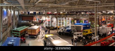 Eindhoven, Netherlands - 24 May 24: Panoramic view inside the DAF Museum in Eindhoven, Netherlands, showing historic vehicles, exhibition zones, and v Stock Photo
