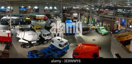 Eindhoven, Netherlands - 24 May 24: Panoramic view of a classic car gallery inside the DAF Museum in Eindhoven, Netherlands, featuring restored vehicl Stock Photo