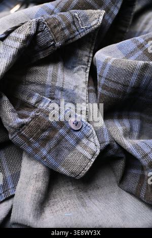 Grey and Off White Cotton Shirt Sleeves with Buttons — Grid Pattern Creased Fabric Macro Close-Up and Soft Defocused Backgrounds Stock Photo