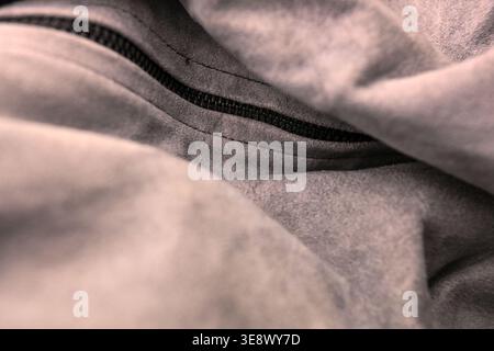 Grey Pure Leather Jacket with Black Zip — Creased Texture Macro Close-Up with Soft Defocused Backgrounds Stock Photo