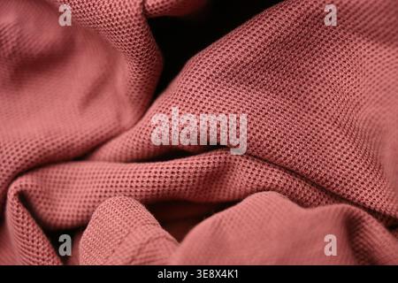Light Pink T-Shirt Fabric Texture — Creased Macro Close-Up with Soft Defocused Backgrounds Stock Photo