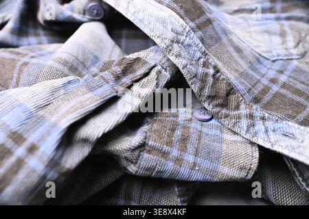 Grey and Off White Cotton Shirt Sleeves with Buttons — Grid Pattern Creased Fabric Macro Close-Up and Soft Defocused Backgrounds Stock Photo