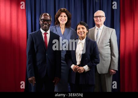 Portrait of diverse business team standing together and smiling at camera, representing leadership and workplace inclusion. Ideal for corporate communication, recruitment, team branding Stock Photo