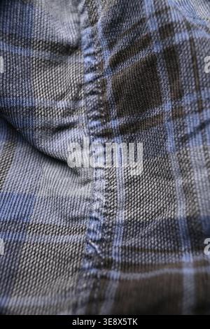 Grey and Off White Cotton Shirt Stretch — Grid Pattern with Horizontal and Vertical Lines, Creased Fabric Macro Close-Up and Soft Defocused Background Stock Photo