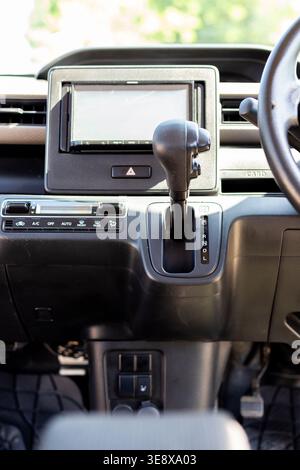 Close-Up of Automatic Transmission Gear Selector in Compact Car Interior Stock Photo