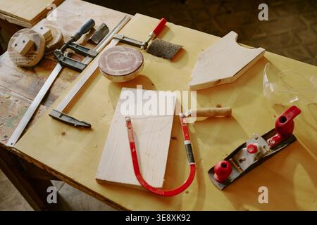 Woodworking Tools Arranged on Workbench for Carpentry Project Stock Photo