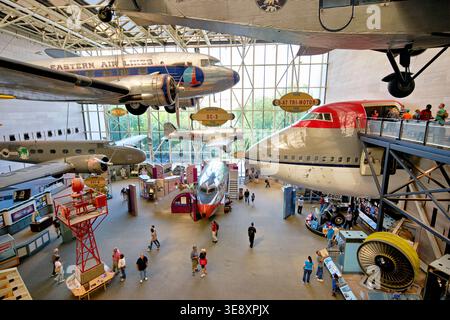 Visitors explore the large exhibit of historic aircraft and displays at the Smithsonian National Air and Space Museum in Washington D.C. Stock Photo