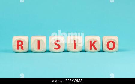 Risk in german language, management and mitigation to reduce exposure for financial investment, business and project planning strategy, reduction Stock Photo