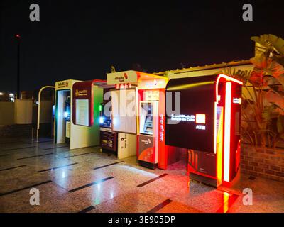 Cairo, Egypt, March 28 2026: several Automated Teller Machines (ATMs) operated by major banks in Egypt, like Banque Misr and NBE Al Ahly National Bank Stock Photo