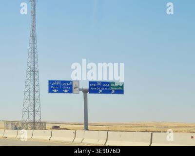 Suez, Egypt, April 13 2026: A highway direction signage in Egypt, on a ...