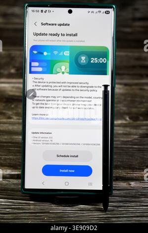 Cairo, Egypt, March 28 2026: Installing Samsung software update for Samsung Flagship cellular phones, Galaxy AI One UI 8.0 upgrade, android version 16 Stock Photo