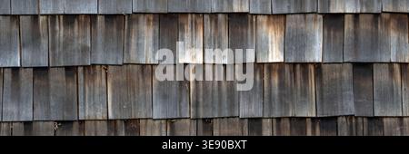 Panorama of old wooden roof shingles for use as a background texture Stock Photo