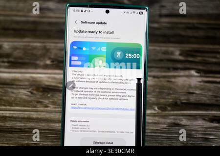 Cairo, Egypt, March 28 2026: Installing Samsung software update for Samsung Flagship cellular phones, Galaxy AI One UI 8.0 upgrade, android version 16 Stock Photo