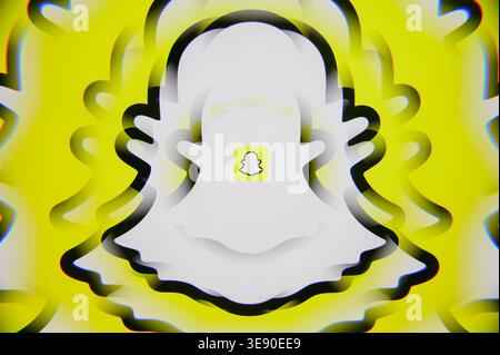 Paris, France - April 16, 2026: Creative and abstract presentation of the Snapchat ghost logo with multiple layered outlines on a yellow background. Stock Photo