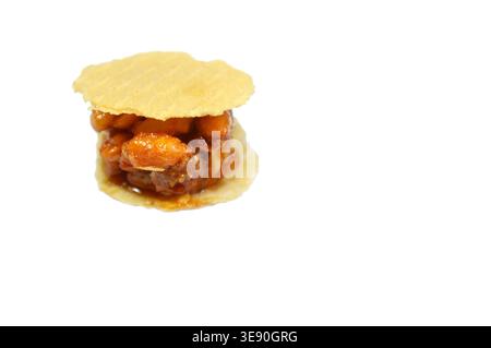 Peanuts small, sweet treats, thin, crispy wafers sandwiching patties of sesame, peanuts or coconut, often held together by honey or sugar, popular on Stock Photo