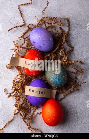 Easter eggs painted in purple and red Stock Photo