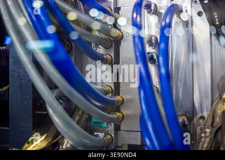Mold plates - part of automatic injection molding machine at exhibition Stock Photo