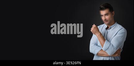 Anonymous man with pixelated face on black background Stock Photo