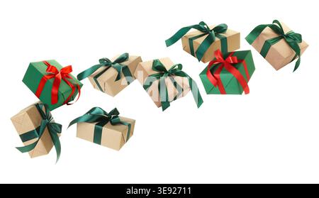 Gift boxes flying in air against white background Stock Photo