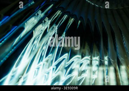 Abstract futuristic background with glowing blue and cyan light waves and glass refraction Stock Photo