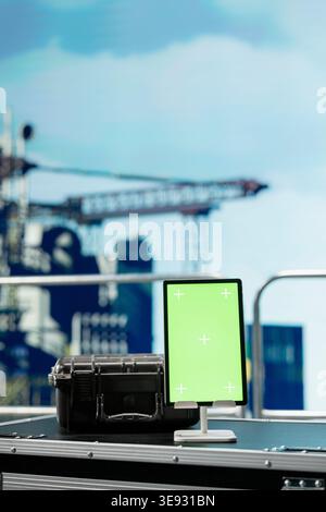 Isolated screen tablet used to inspect integrity of offshore platform equipment parts. Close up of mockup device used on drilling barge deck to detect malfunction in subsea pipelines Stock Photo