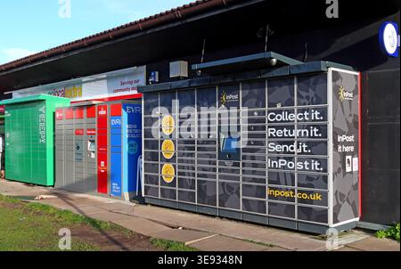Multiple parcel lockers outside Today’s Extra in Thelwall, Warrington, offering mail order collection, returns and drop-off services. Stock Photo