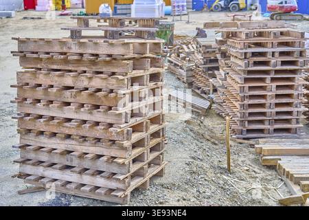 Pallets on construction site, wooden pallets, construction Stock Photo