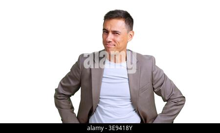 Confident man smirking and looking at camera Stock Photo