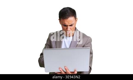 Frustrated man concentrating on laptop with transparent background Stock Photo