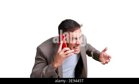 Stressed businessman receiving bad news on phone call Stock Photo