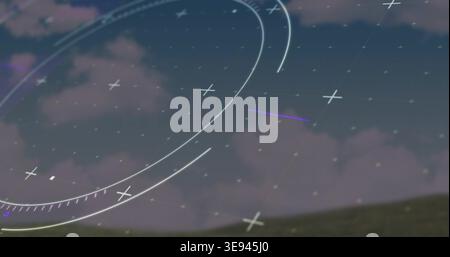 Displaying HUD overlay hovering over grassy hill at dusk, with concentric arcs and dotted grid Stock Photo
