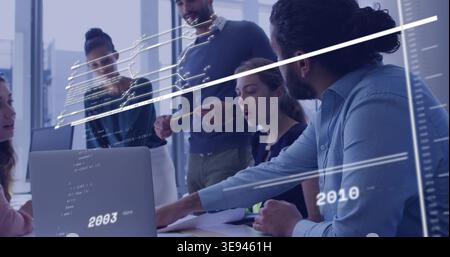 Collaborating five professionals in business-casual at office table, with laptop and code overlays Stock Photo