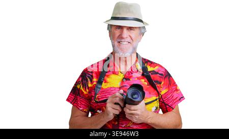 Senior man smiling holding camera traveling on vacation Stock Photo
