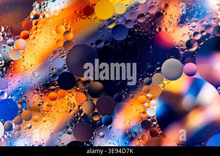 Electric Hues With Flowing Motion. Vivid Neon Bubbles Accented By Orange Streaks And Flowing Lights Stock Photo
