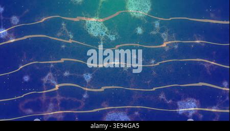 Flowing thin wavy gold ribbons spanning blue-violet field, with filaments and glowing dots Stock Photo