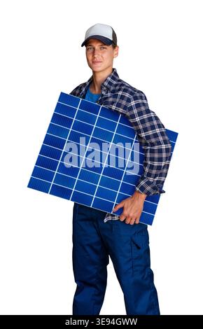Green energy solutions demonstrated by confident female specialist holding photovoltaic solar panel. Stock Photo