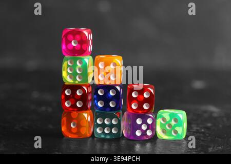 Colorful game dices on black background Stock Photo