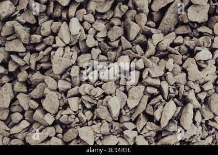 Granite gravel chips materials for the construction. Natural crushed granite gravel as a background. Industrial design. Granite gravel texture Stock Photo