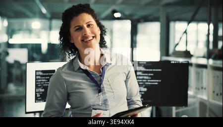 Happy woman, portrait or programmer with tablet in office for artificial intelligence or programming. Female person, IT engineer or smile with Stock Photo