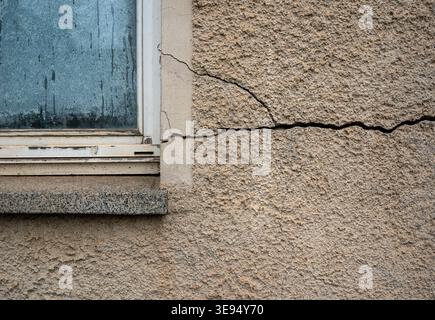 Large crack in a house wall Stock Photo