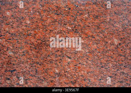 Red granite stone texture background Stock Photo