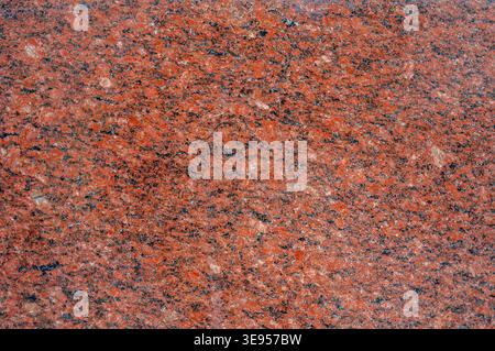 Red granite stone texture background Stock Photo