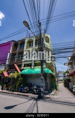 Messy overhead electricity wire cables on a power pole in Chiang Mai, Thailand Stock Photo