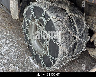 Truck tires with snow chains symbol image Stock Photo