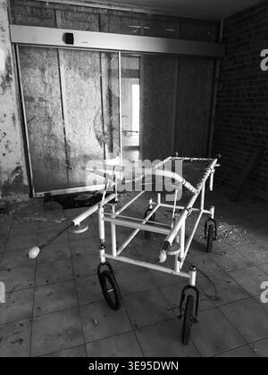 old abandoned Hospital corridor with sick bed Stock Photo