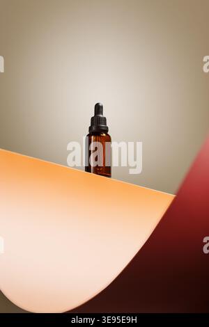 Amber serum dropper bottle on warm set Stock Photo
