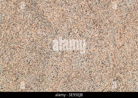 Detailed granite paving slabs photographed from above as exterior urban flooring surface. Stock Photo