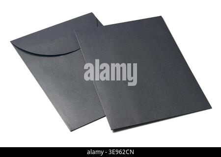 two closed matte black paper envelopes isolated white background, overlapping stationery items, mockup template with copy space Stock Photo
