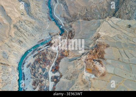 Aerial view of the Hunza River winding through the arid landscape of ...