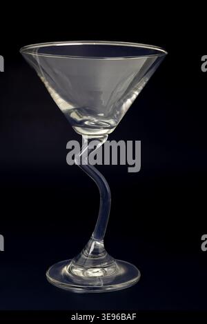 A cocktail or a mock tail glass against a black background Stock Photo
